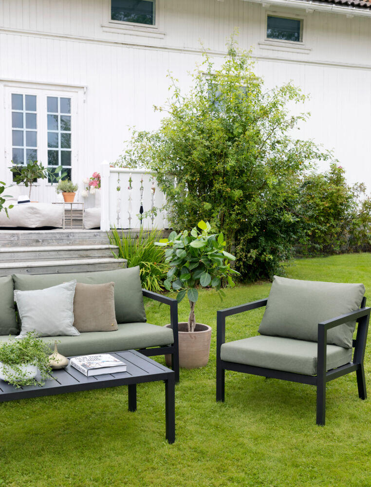 Røst sofagruppe sort og grønne vanntette putetrekk