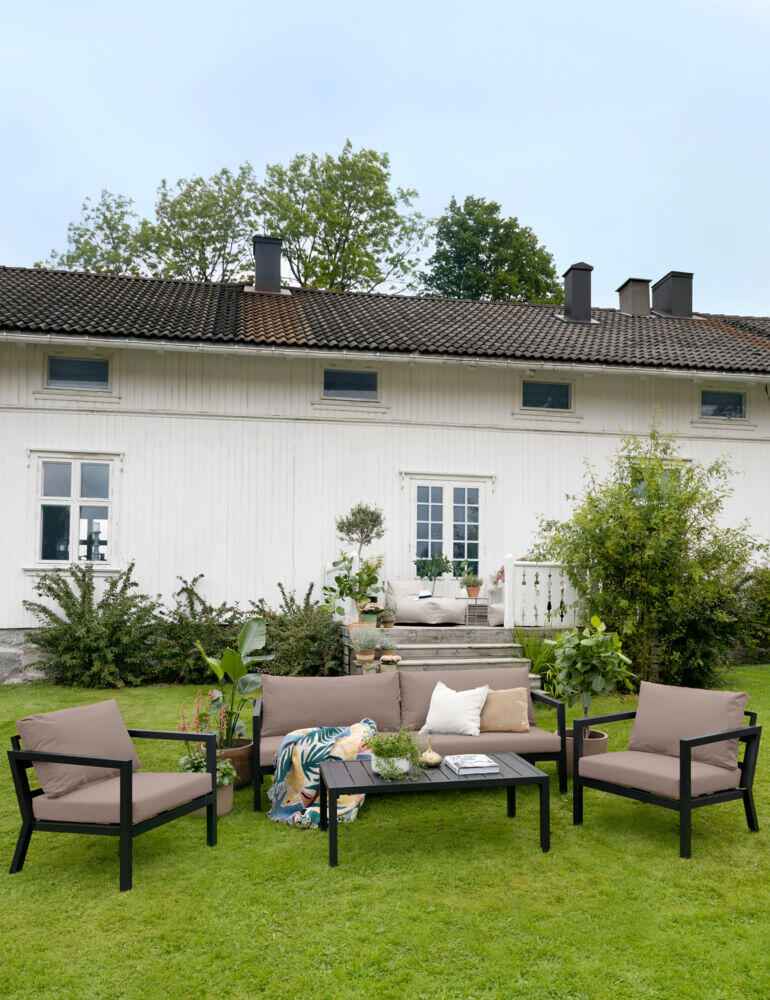 Røst sofagruppe sort og brune vanntette putetrekk