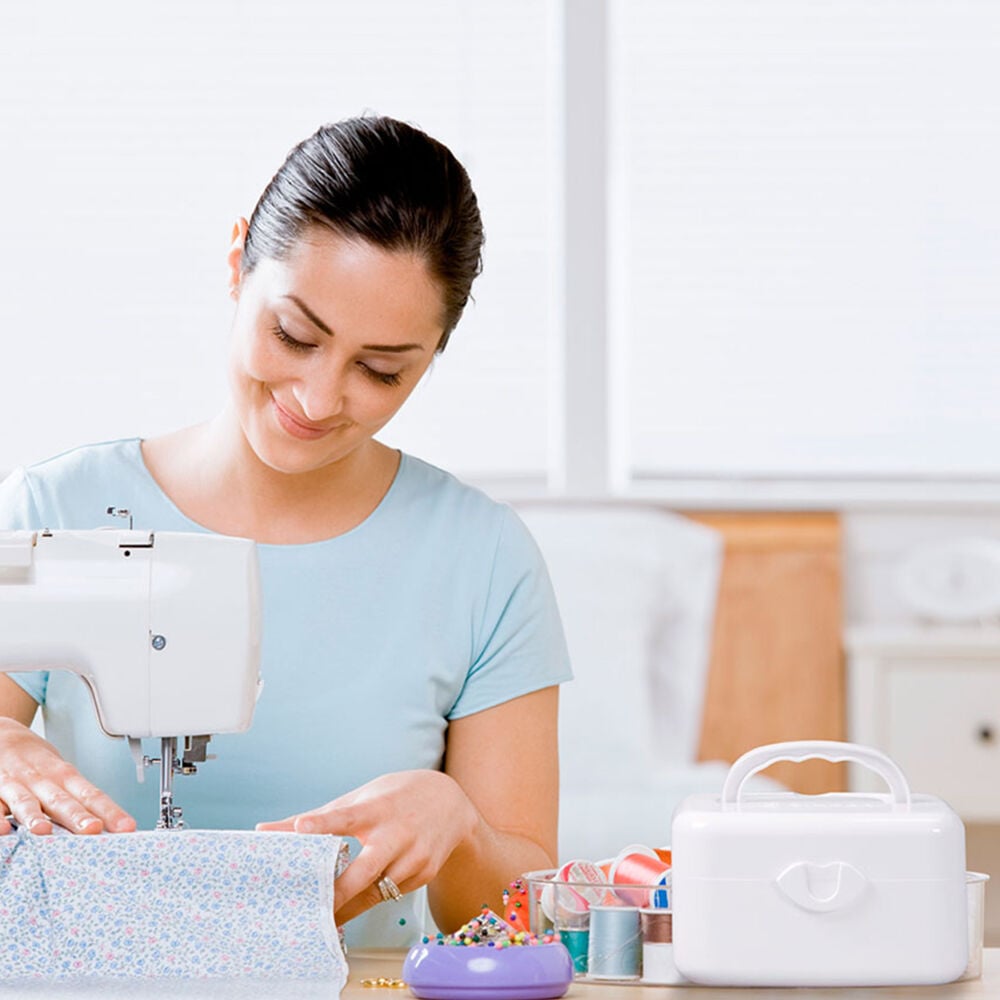 SINGER® portabel trådspoler