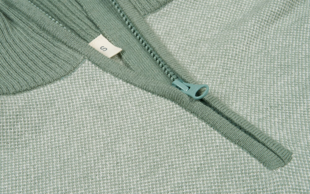 Produkt miniatyrebild Tufte Robin Stitch half-zip ullgenser dame